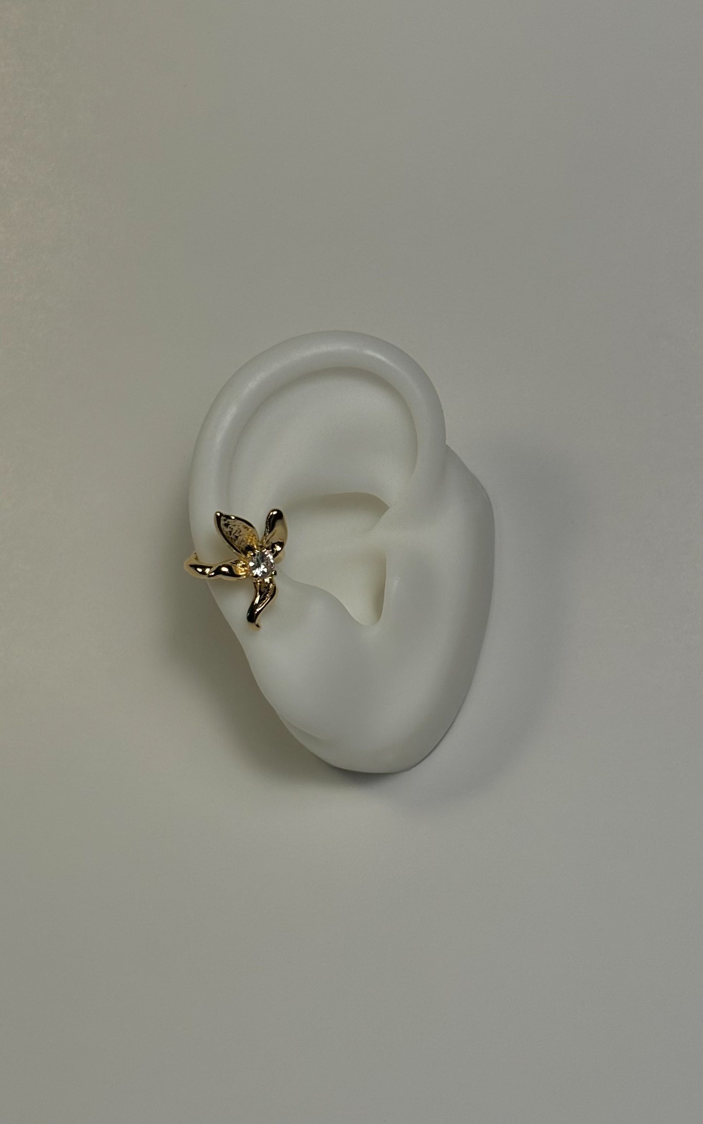Pendiente de oreja con forma de flor